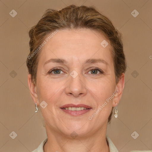 Joyful white adult female with short  brown hair and brown eyes