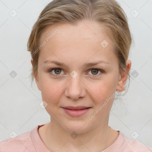 Joyful white young-adult female with medium  brown hair and blue eyes