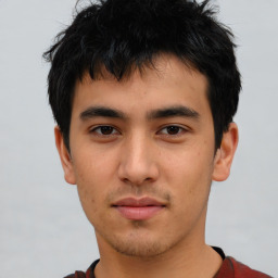 Neutral asian young-adult male with short  brown hair and brown eyes