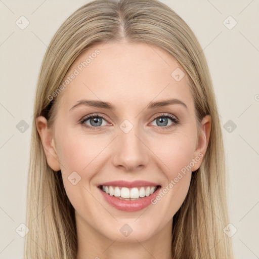 Joyful white young-adult female with long  brown hair and grey eyes