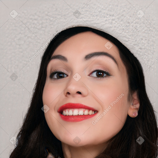 Joyful white young-adult female with long  black hair and brown eyes