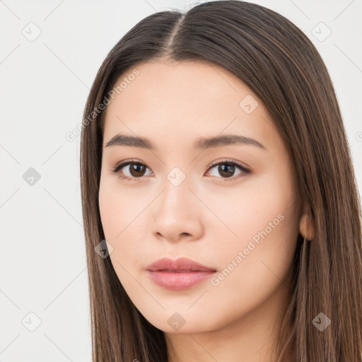 Neutral white young-adult female with long  brown hair and brown eyes