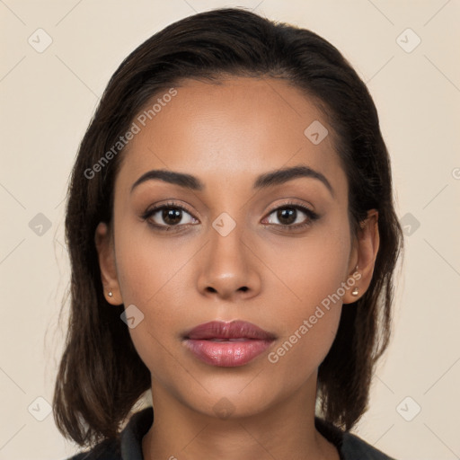 Neutral white young-adult female with long  brown hair and brown eyes