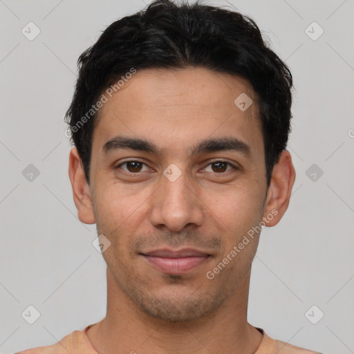 Joyful white young-adult male with short  black hair and brown eyes