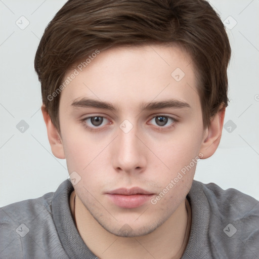 Neutral white young-adult male with short  brown hair and grey eyes