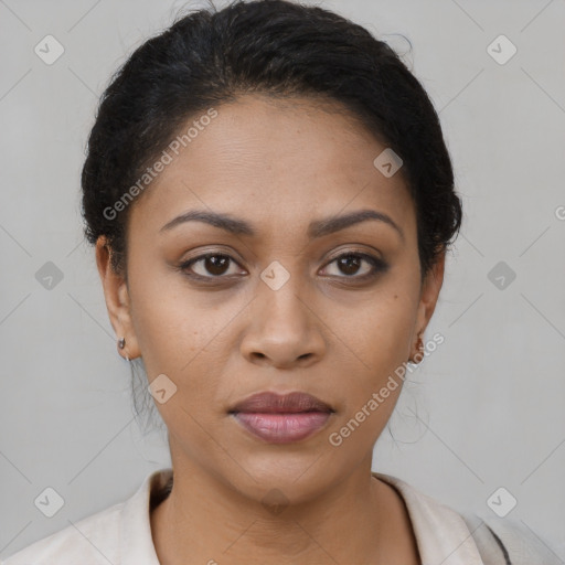 Joyful latino young-adult female with short  brown hair and brown eyes