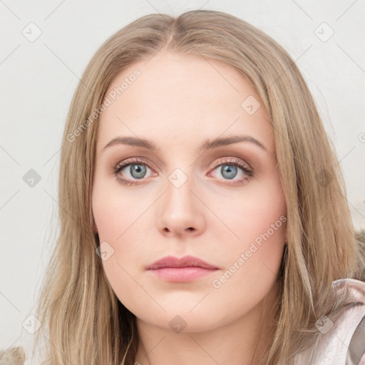 Neutral white young-adult female with long  brown hair and blue eyes