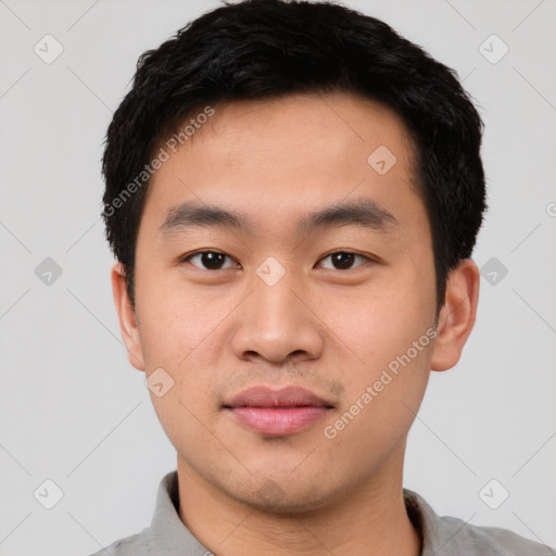 Neutral asian young-adult male with short  black hair and brown eyes