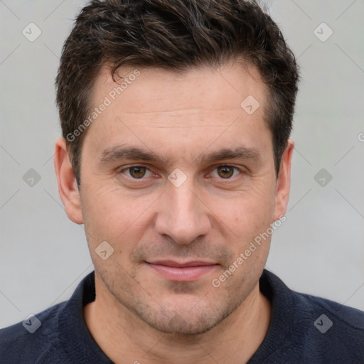 Joyful white adult male with short  brown hair and brown eyes