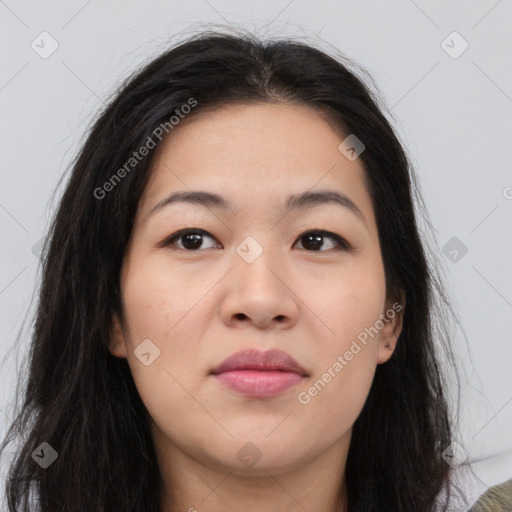 Joyful asian young-adult female with long  brown hair and brown eyes