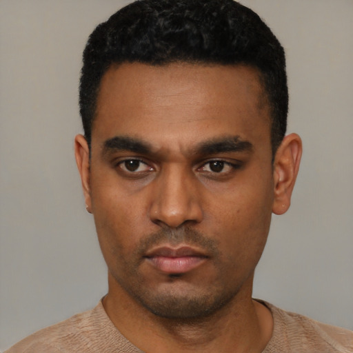 Neutral latino young-adult male with short  black hair and brown eyes