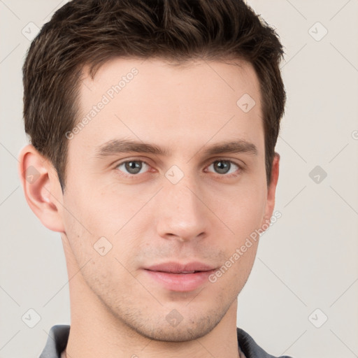 Neutral white young-adult male with short  brown hair and grey eyes