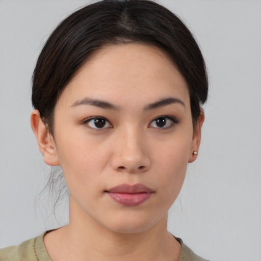 Neutral white young-adult female with short  brown hair and brown eyes