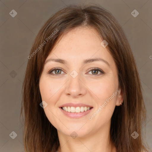 Joyful white young-adult female with long  brown hair and brown eyes