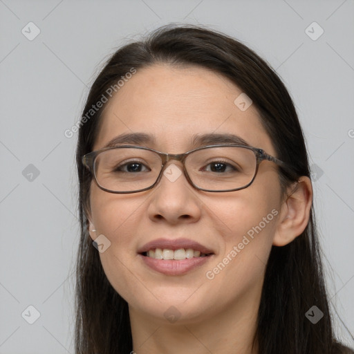 Joyful white young-adult female with long  brown hair and brown eyes