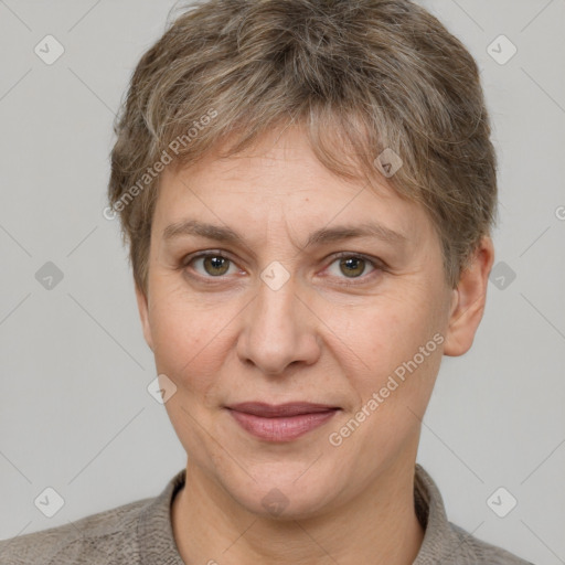 Joyful white adult female with short  brown hair and grey eyes