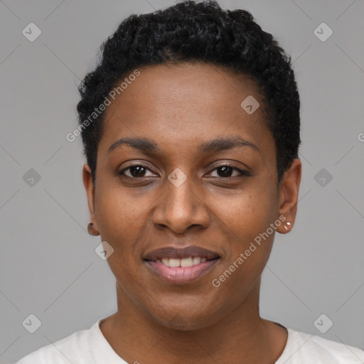 Joyful black young-adult female with short  black hair and brown eyes