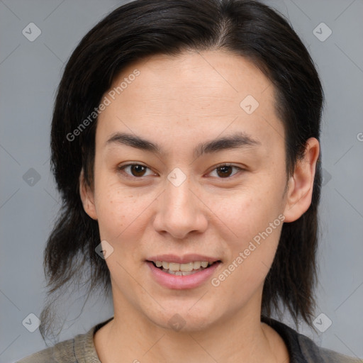 Joyful white young-adult female with medium  brown hair and brown eyes