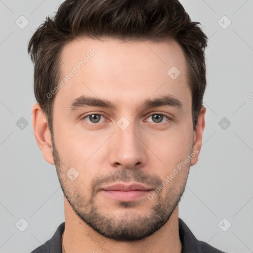 Neutral white young-adult male with short  brown hair and brown eyes