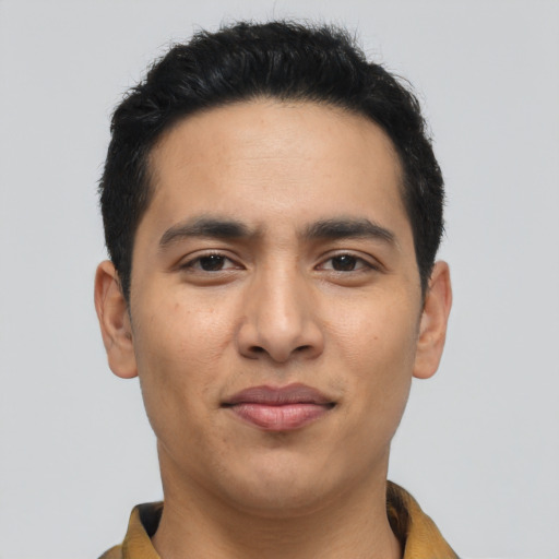 Joyful asian young-adult male with short  black hair and brown eyes
