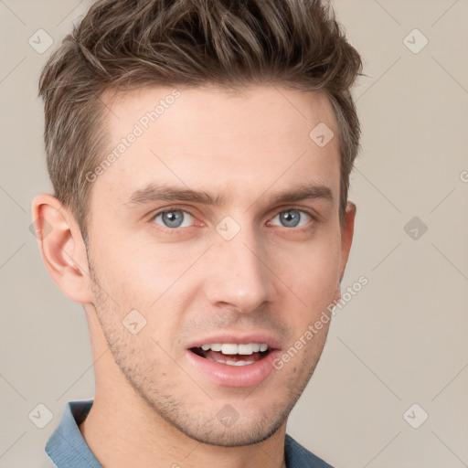 Joyful white young-adult male with short  brown hair and grey eyes