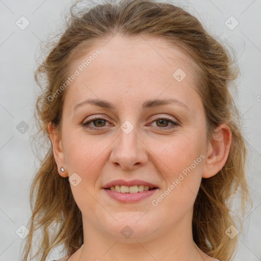 Joyful white young-adult female with medium  brown hair and blue eyes