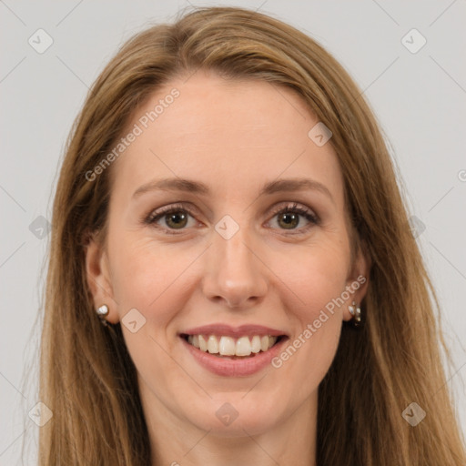 Joyful white young-adult female with long  brown hair and green eyes