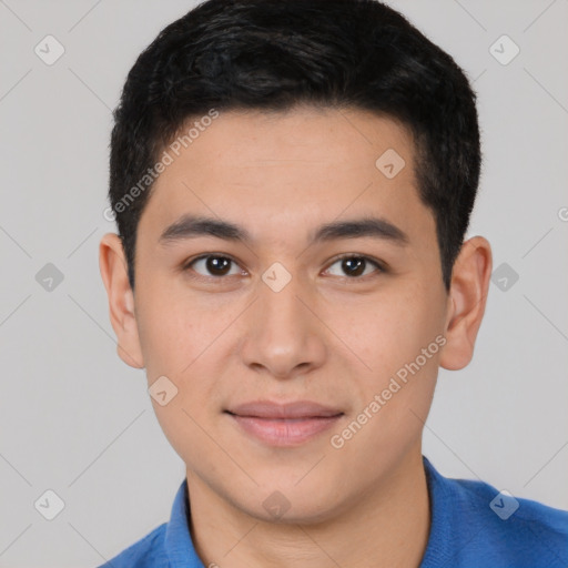 Joyful white young-adult male with short  black hair and brown eyes