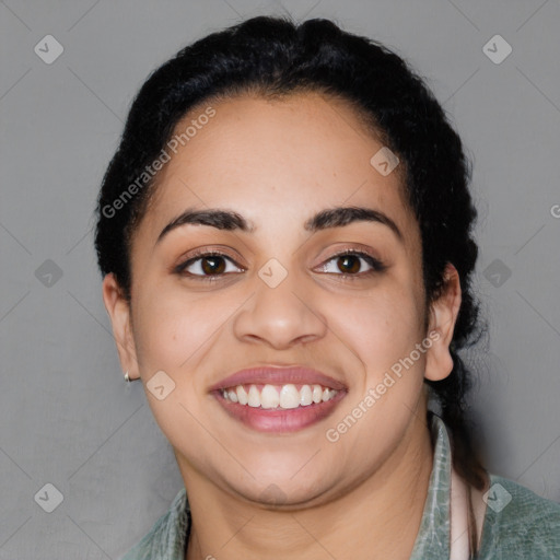 Joyful latino young-adult female with medium  black hair and brown eyes