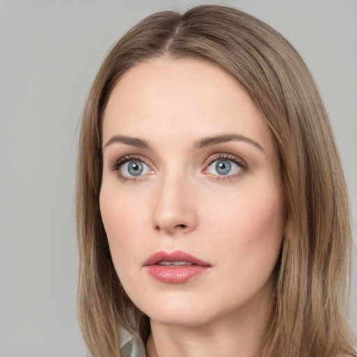 Neutral white young-adult female with long  brown hair and grey eyes