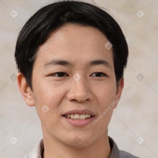 Joyful asian young-adult male with short  brown hair and brown eyes