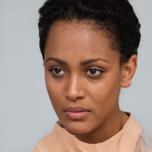 Neutral black young-adult female with short  brown hair and brown eyes