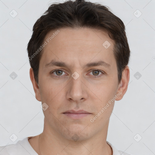 Neutral white young-adult male with short  brown hair and brown eyes