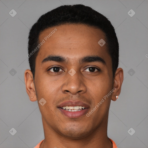 Joyful latino young-adult male with short  black hair and brown eyes