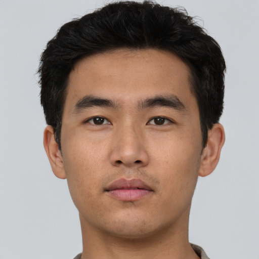 Neutral asian young-adult male with short  brown hair and brown eyes