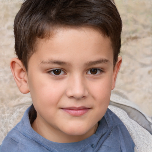 Joyful white child male with short  brown hair and brown eyes