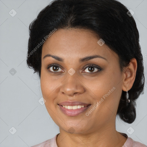 Joyful black young-adult female with medium  brown hair and brown eyes