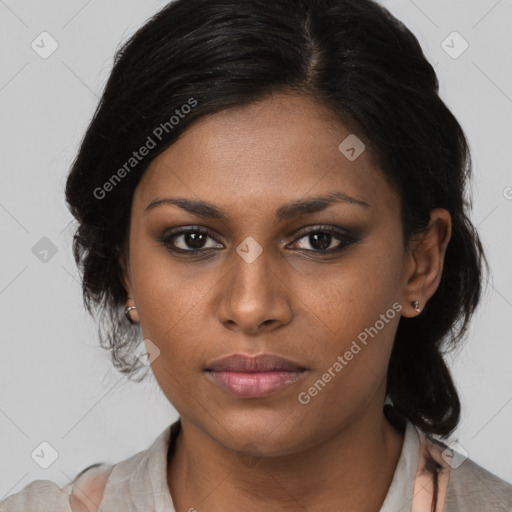 Joyful latino young-adult female with medium  brown hair and brown eyes