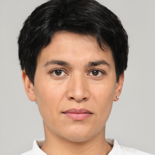 Joyful asian young-adult male with short  brown hair and brown eyes