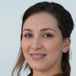 Joyful white young-adult female with medium  brown hair and brown eyes