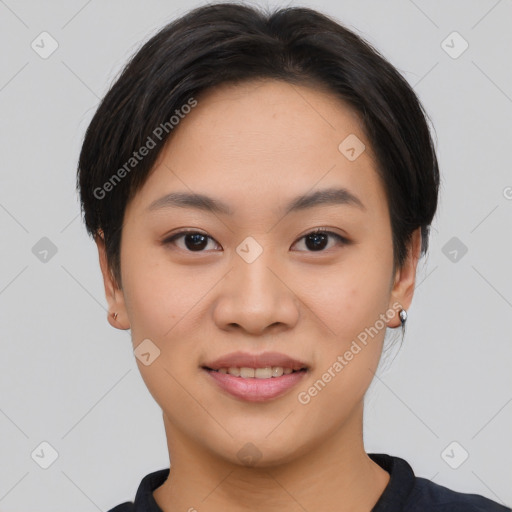 Joyful asian young-adult female with short  brown hair and brown eyes