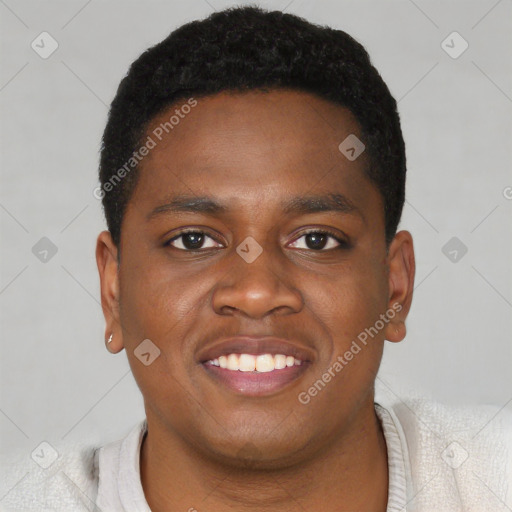 Joyful black young-adult male with short  brown hair and brown eyes