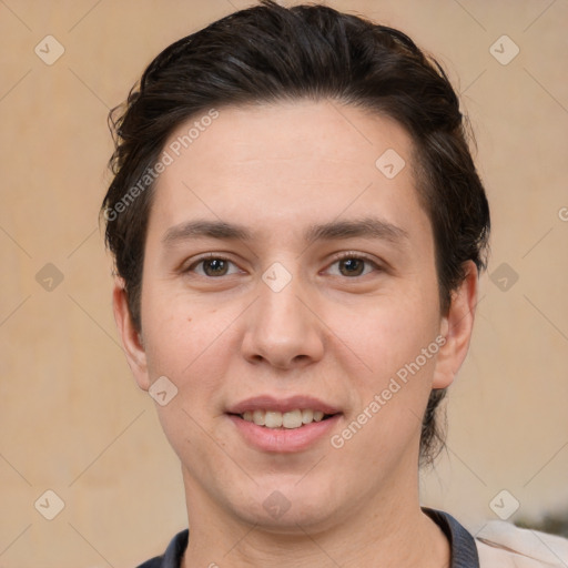 Joyful white adult female with short  brown hair and brown eyes