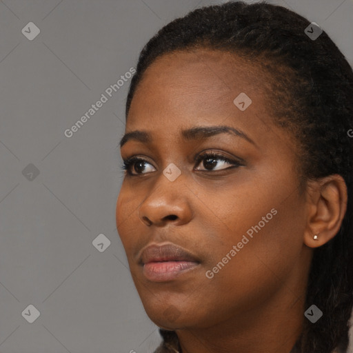 Neutral black young-adult female with short  black hair and brown eyes