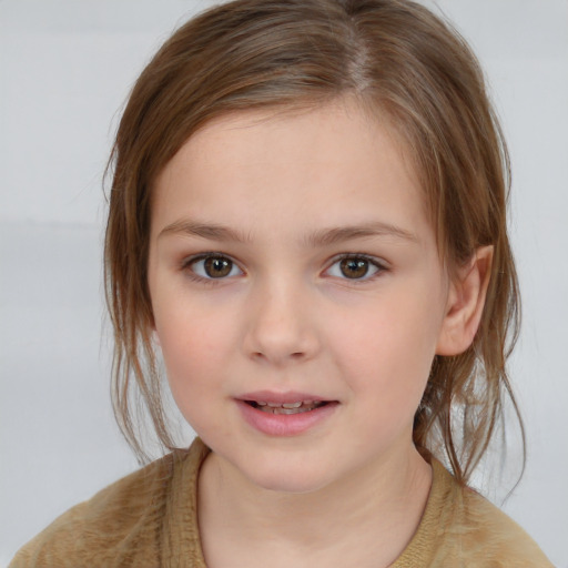 Joyful white child female with medium  brown hair and brown eyes