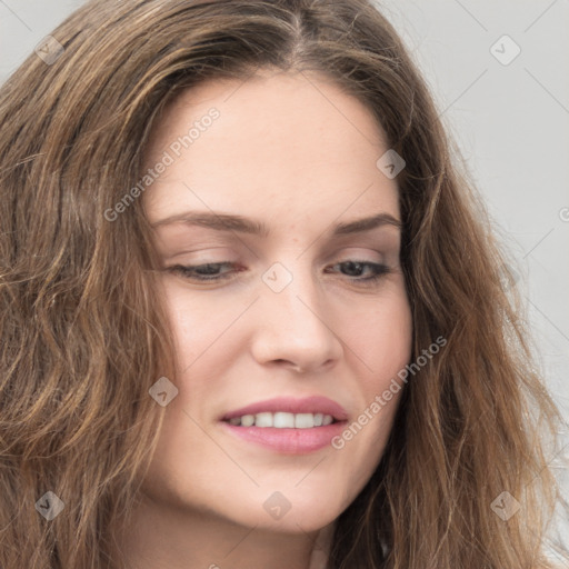 Joyful white young-adult female with long  brown hair and green eyes