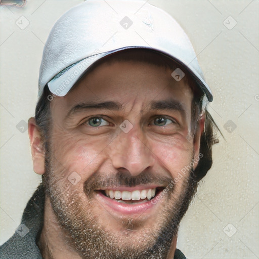 Joyful white adult male with short  brown hair and grey eyes