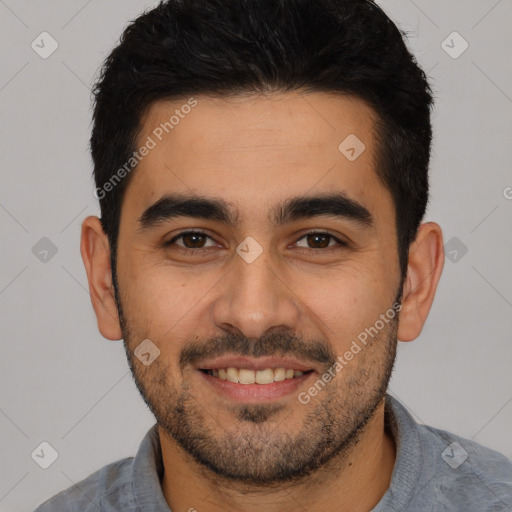 Joyful white young-adult male with short  black hair and brown eyes