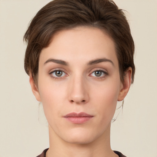 Neutral white young-adult female with short  brown hair and brown eyes