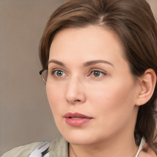 Neutral white young-adult female with medium  brown hair and brown eyes